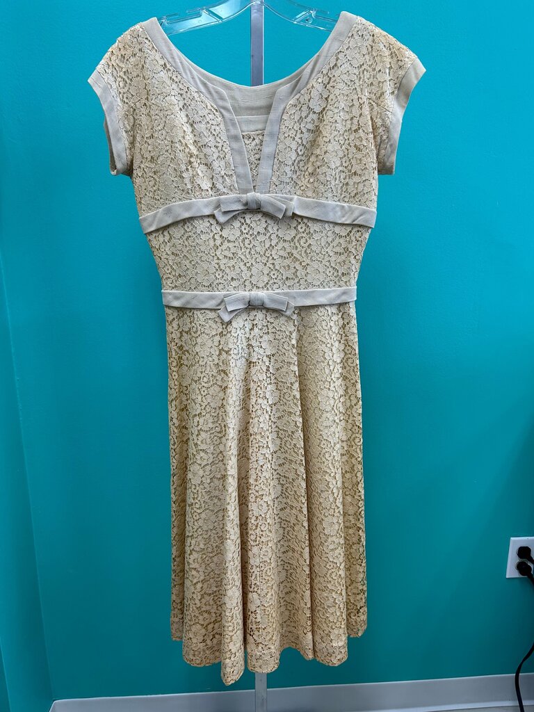 Vintage Lace Pattern Dress with Bow Accents