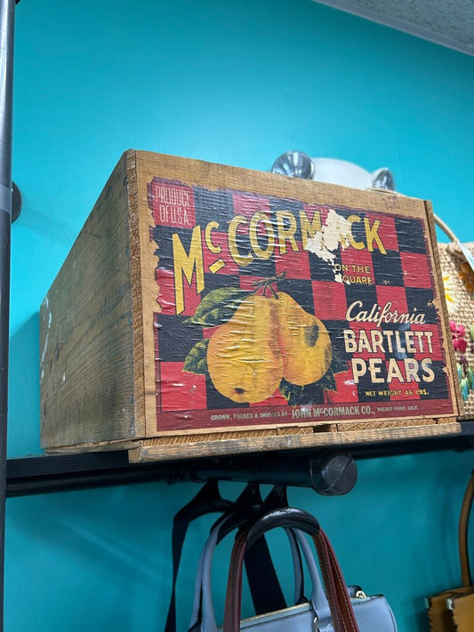 vintage wooden fruit crate featuring an original 1950s "McCormack" brand label