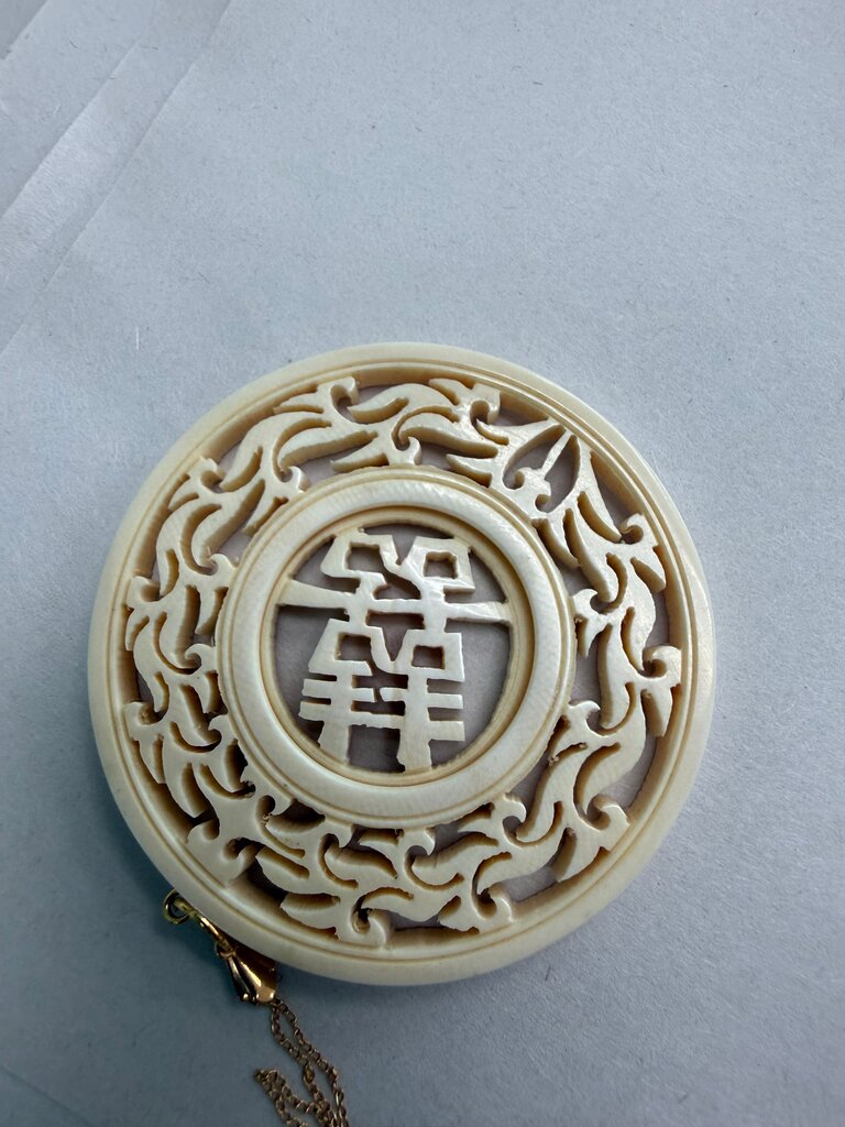 Carved bone Chinese Double Happiness openwork pendant