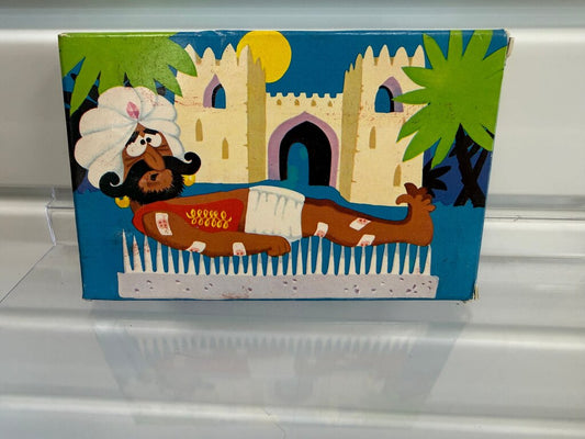 1976 Avon Novelty Bed of Nails "Guru of Good Grooming" Comb